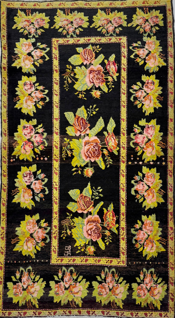 Decorative rug with floral patterns on a black background