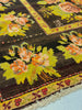 Close-up of a floral patterned rug with intricate designs.
