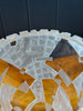 Close-up of a round vase with geometric patterns