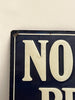 Vintage-style 'No Parking' sign with a plain background
