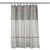 Gray linen curtain with decorative trim on a white background