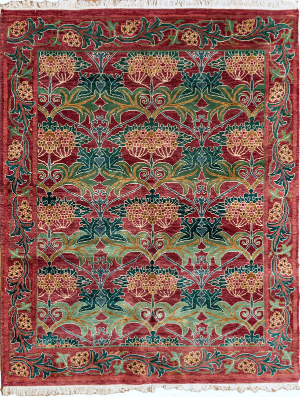 Decorative rug with intricate patterns in red, green, and gold on a white background. in an art deco in the style of William Morris