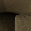 Close-up of a textured brown fabric surface