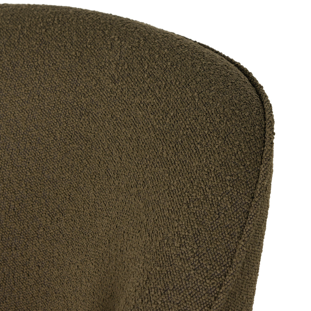 Close-up of a brown green textured cushion on a white background