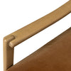 Close-up of a wooden chair armrest and brown cushion on a white background