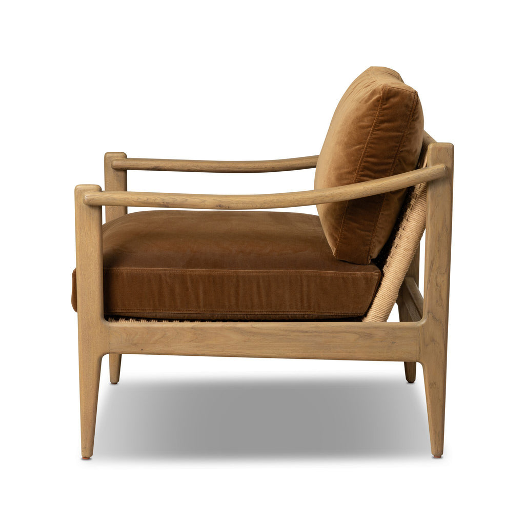Brown armchair with wooden frame on a white background