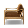 Brown armchair with wooden frame on a white background