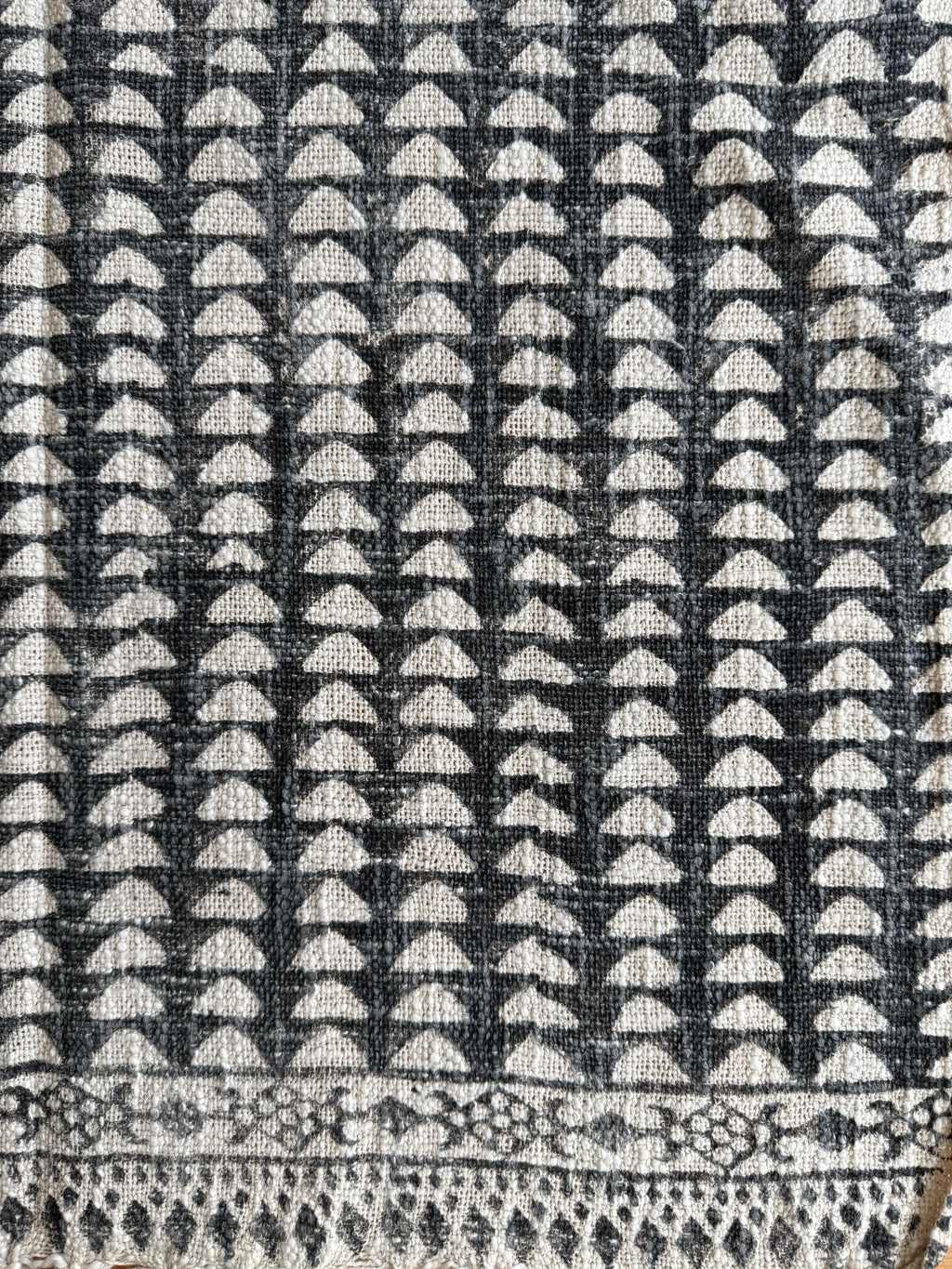 Textile with a geometric pattern on a black background