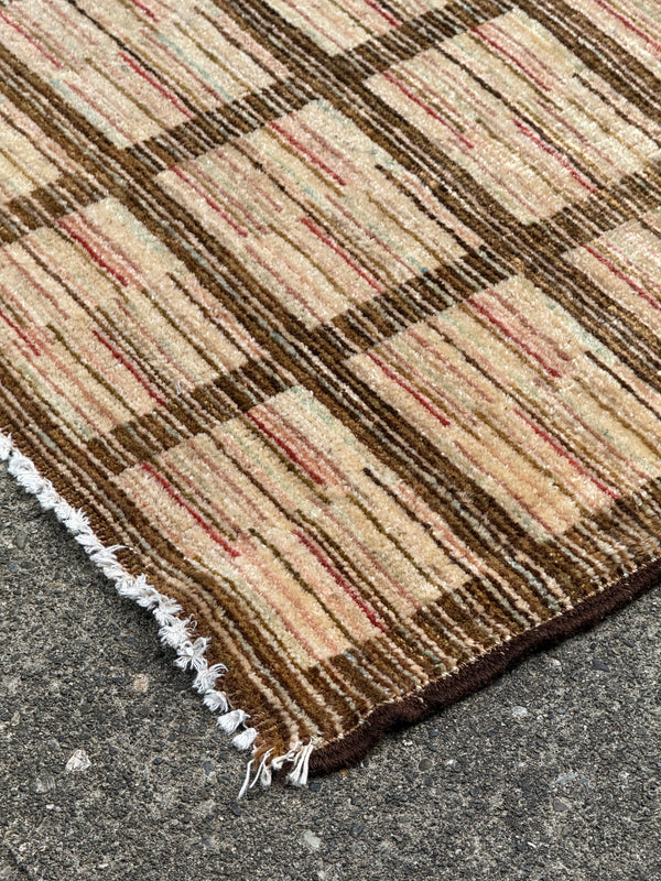 Detail of Plaid patterned rug flat weave gabbeh rug