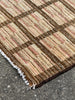 Detail of Plaid patterned rug flat weave gabbeh rug