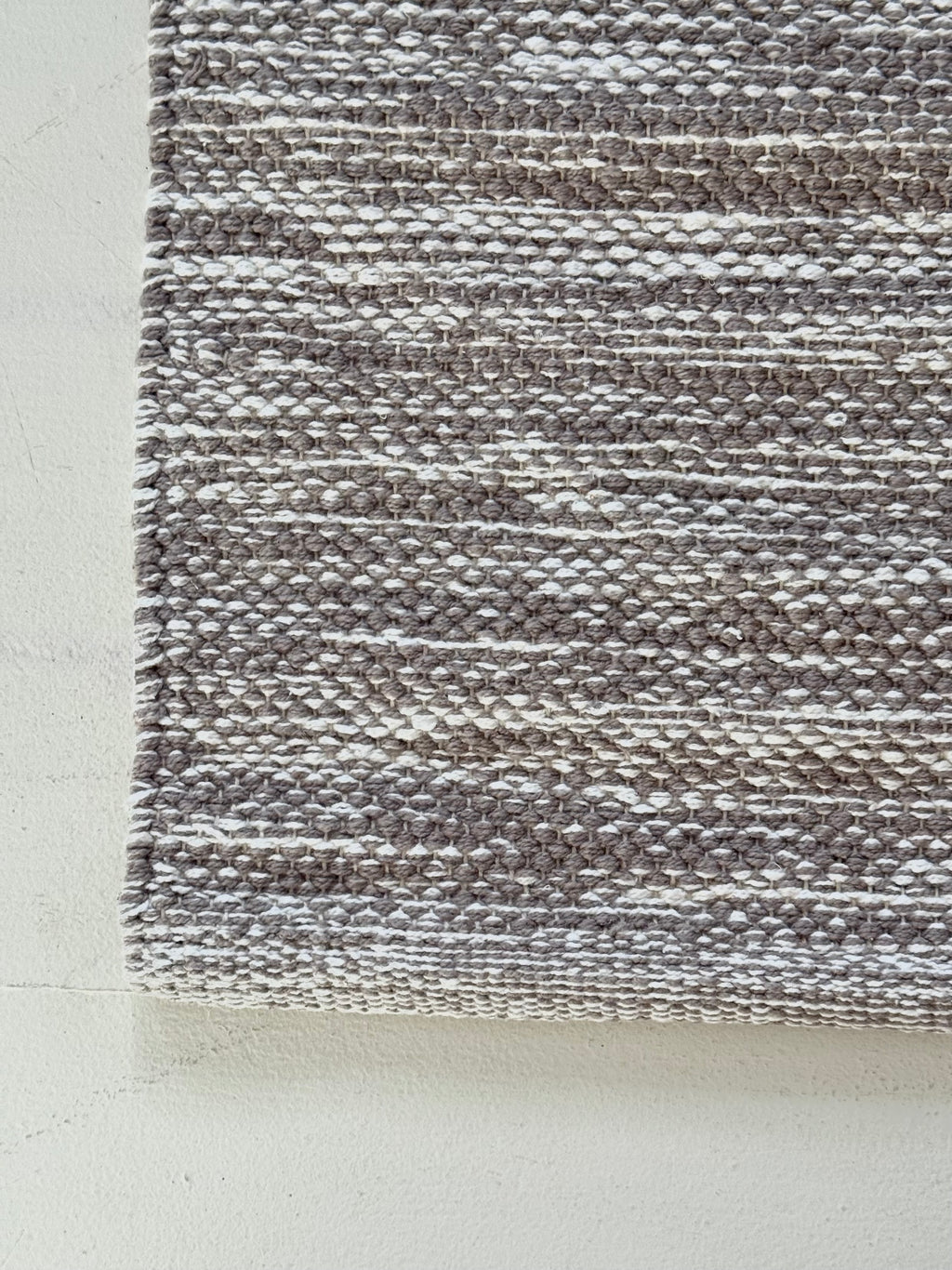 detailed woven rug