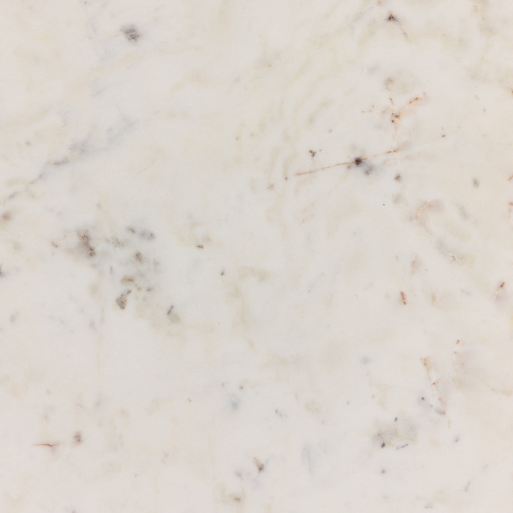 Close-up of a marble surface with beige and gray veins