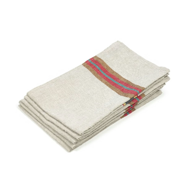 Stack of folded towels with a striped pattern on a white background