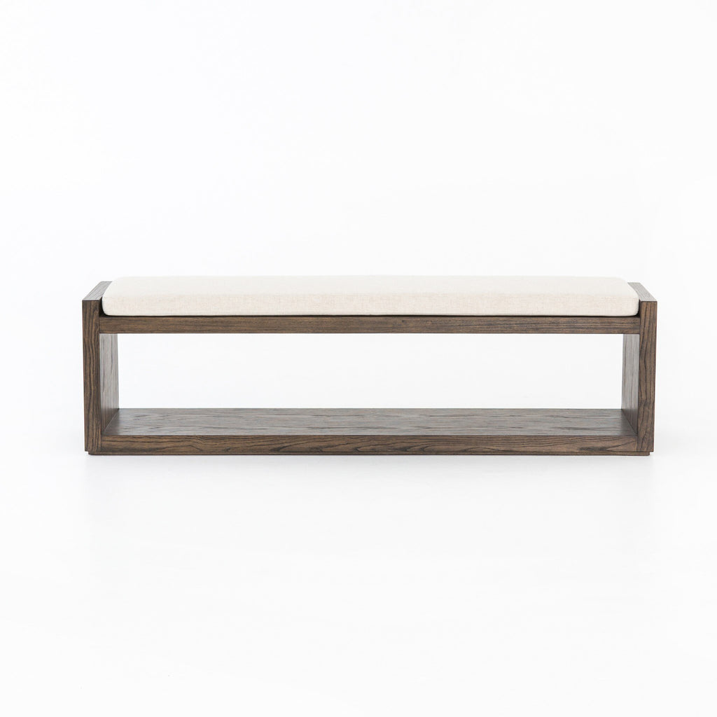 Wooden bench with white cushion on a white background