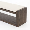 Wooden bench with a white cushion on a white background