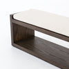 Wooden bench with a white cushion on a white background