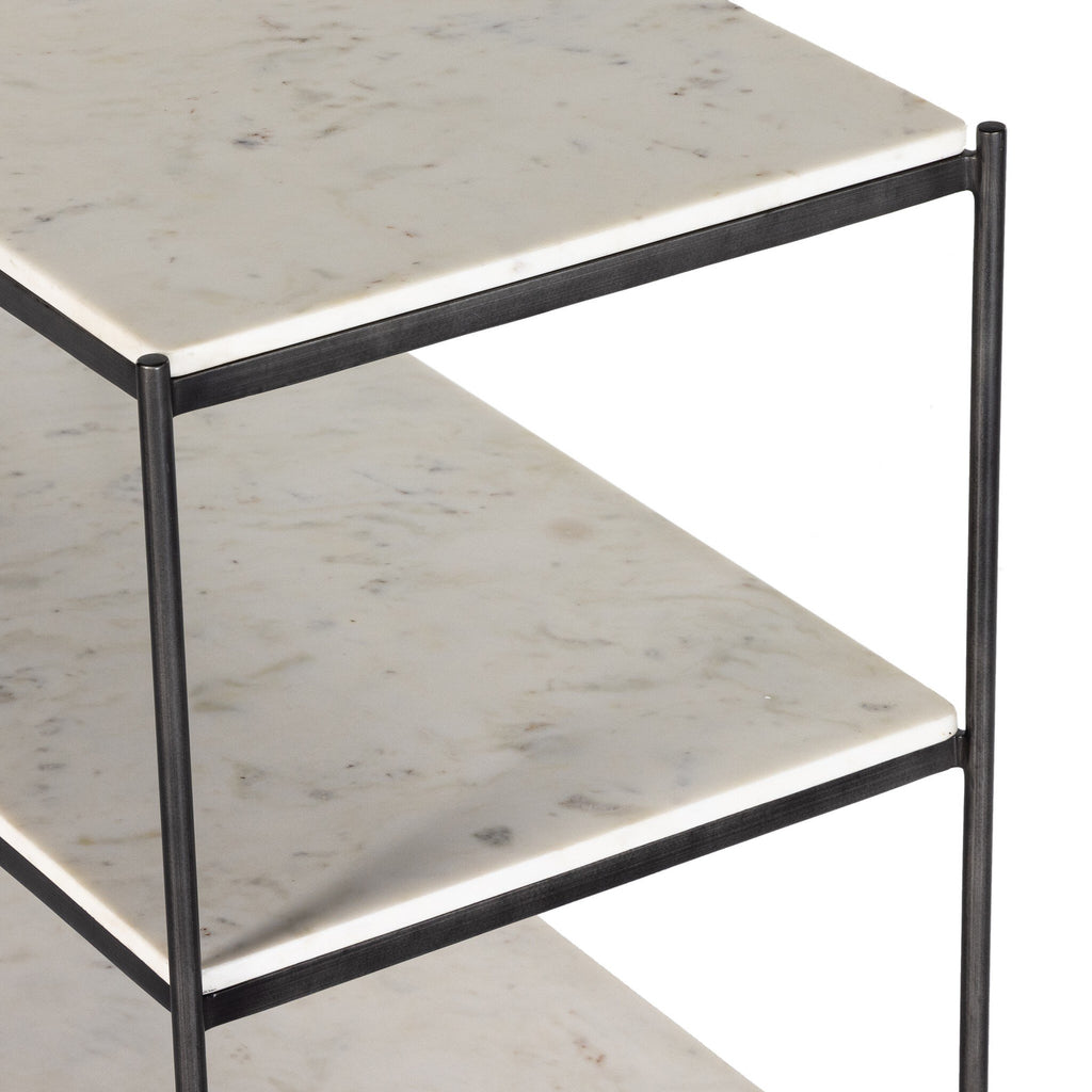 Two-tiered side table with marble top and black metal frame on a white background