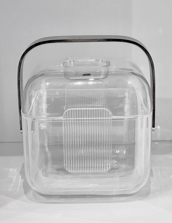 Clear plastic ice bucket with a lid on a white background