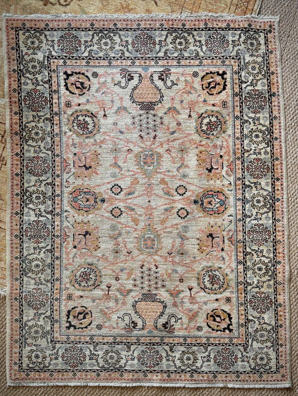 Decorative rug with intricate patterns on a textured surface