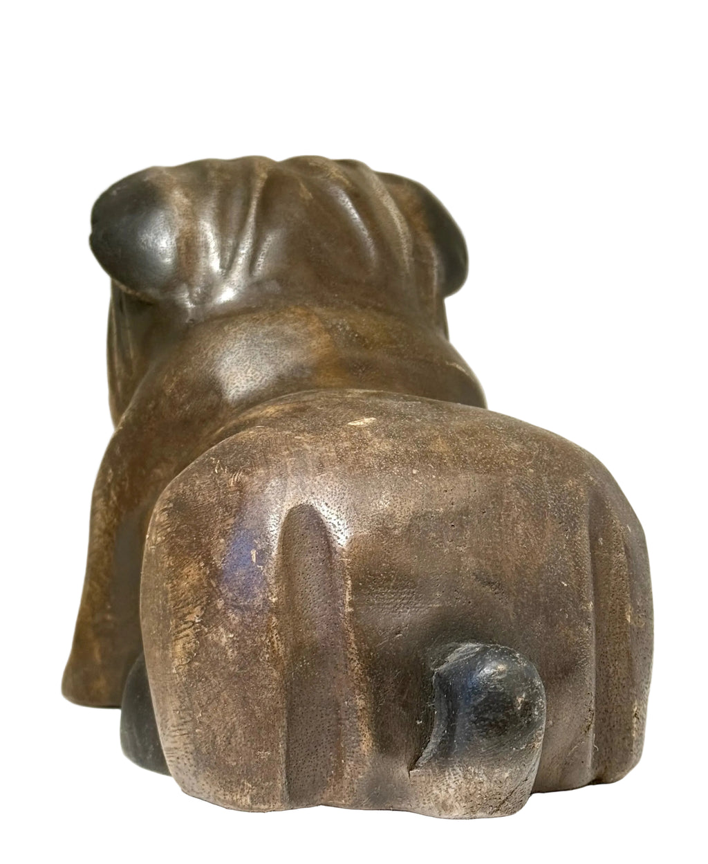 wood sculpture of a dog on a white background