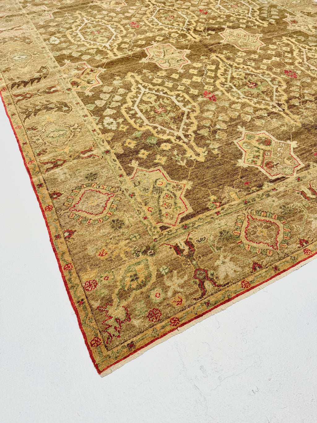 Decorative rug with intricate patterns on a plain background