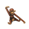 Wooden monkey toy on a white background