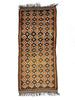 Decorative rug with geometric pattern on a white background