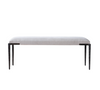 Light gray upholstered bench with dark metal legs on a white background
