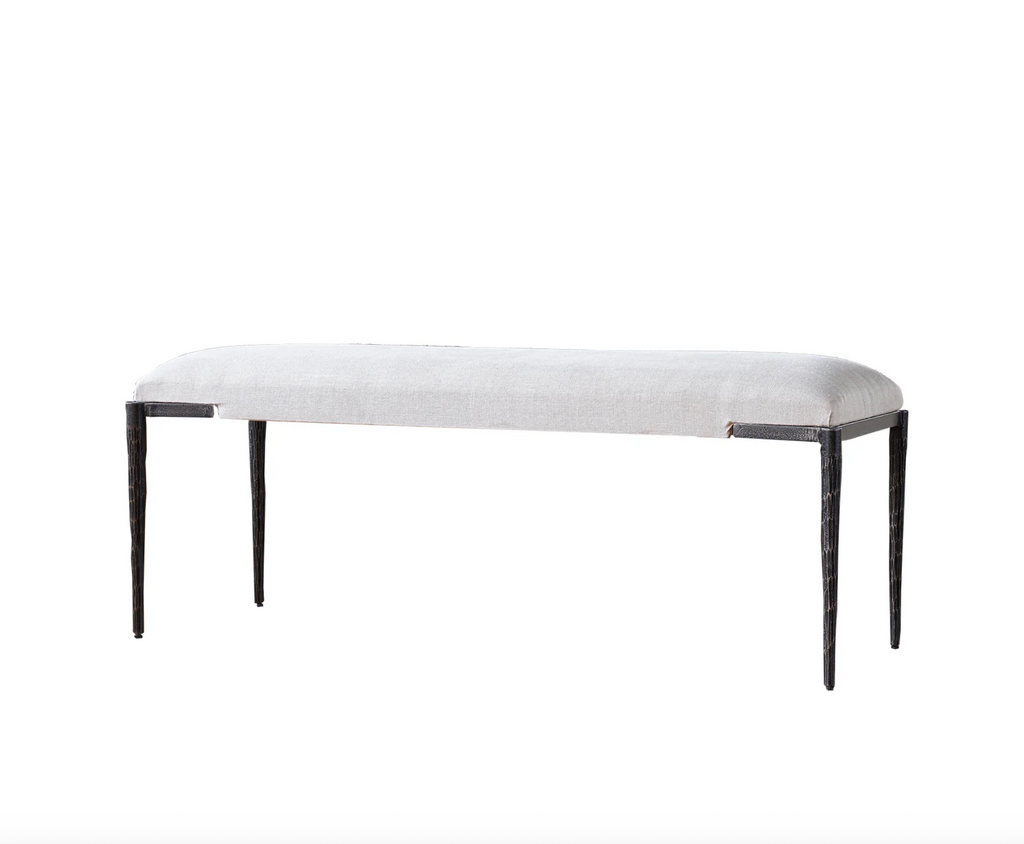 White bench with black legs on a white background