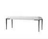White bench with black legs on a white background