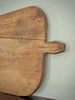 Vintage wooden cutting board with a handle 