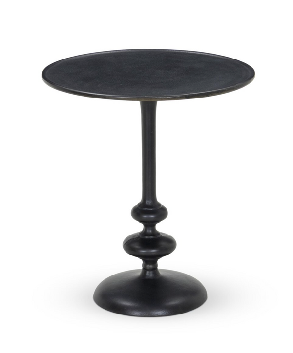 Black side table with a round top and textured base on a white background