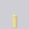 Yellow ribbed bottle on a light gray background