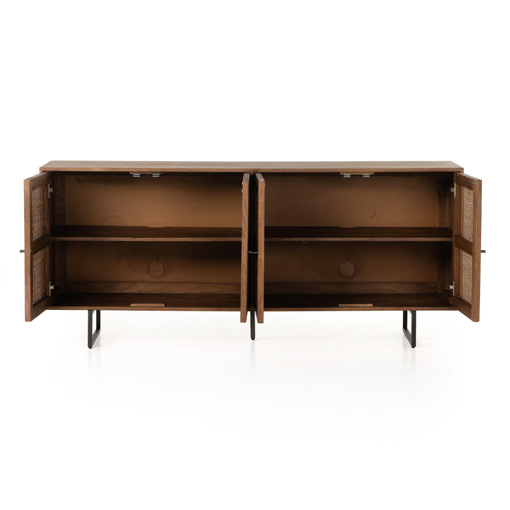 Wooden sideboard with open doors on a white background