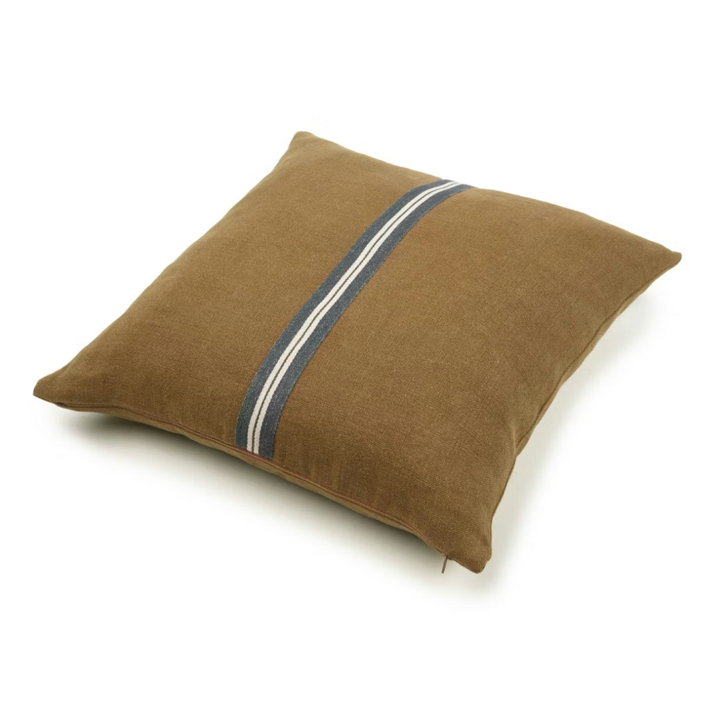 Brown pillow with a blue stripe on a white background