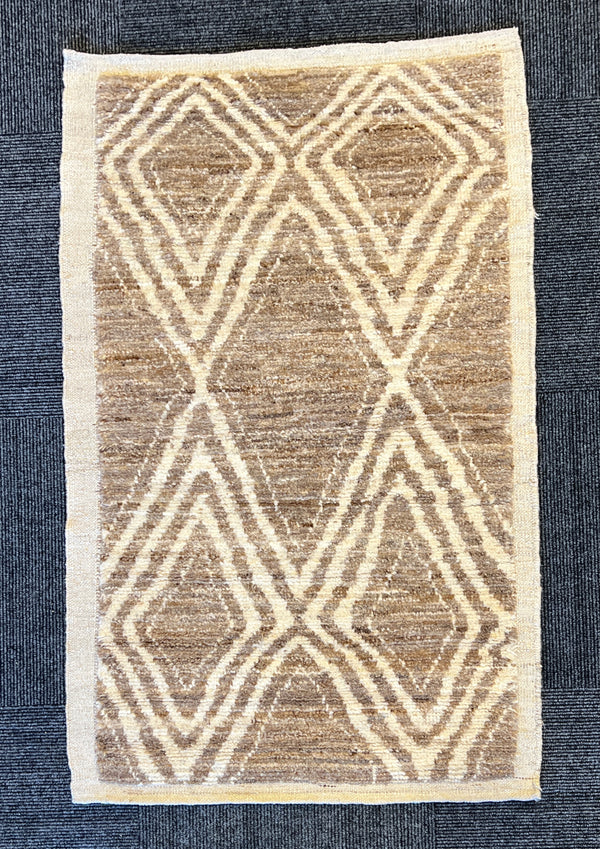 wool rug with geometric pattern handwoven