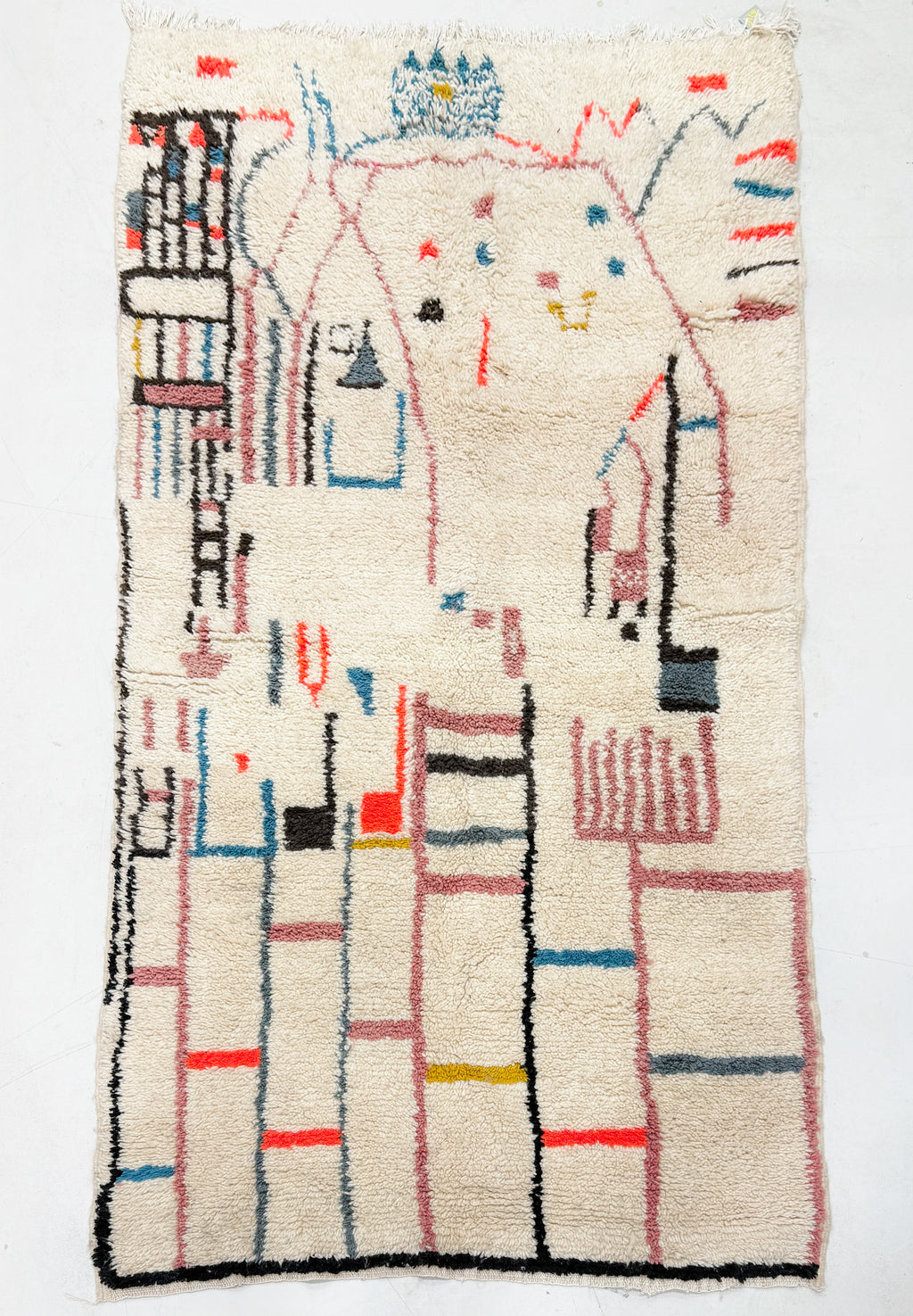 vintage Moroccan rug with abstract design on a white background