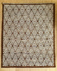 Rug with diamond pattern on a beige background