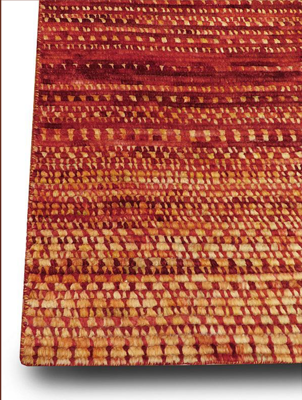 Textured red and brown patterned fabric on a white background