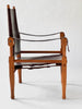 Wooden chair with leather seat and backrest on a white background