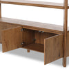 Wooden cabinet with open doors on a white background