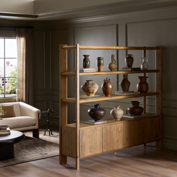 Wooden shelf bookcase with decorative vases in a living room setting