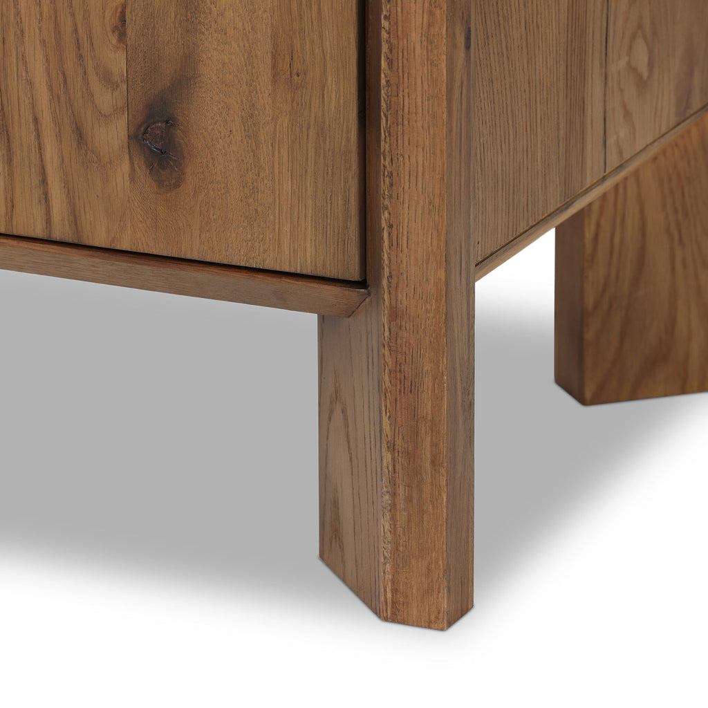 Close-up of a wooden bookcase corner on a white background