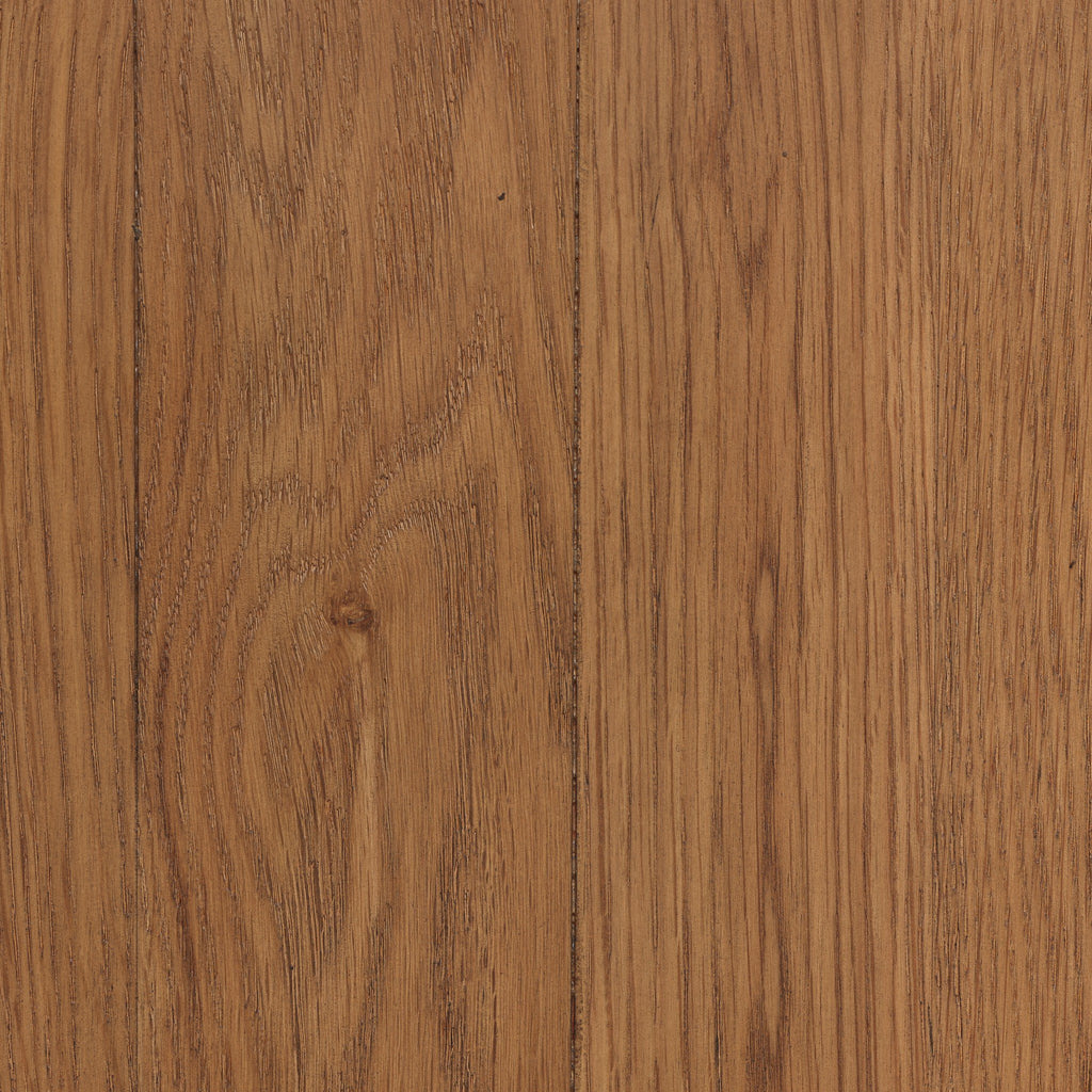 Close-up of a wooden surface with a warm brown color and visible grain pattern.