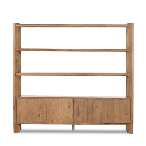 Wooden bookshelf with four shelves and a cabinet below on a white background