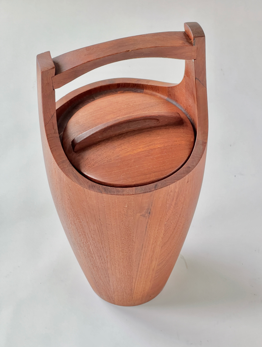 Wooden trash can with a lid and handle on a white background