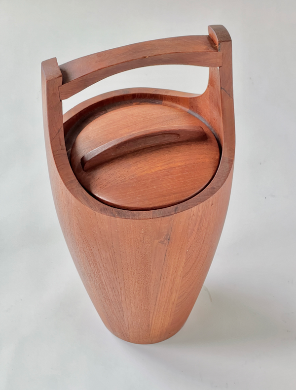 Wooden trash can with a lid and handle on a white background
