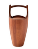 Wooden vase with a handle on a white background