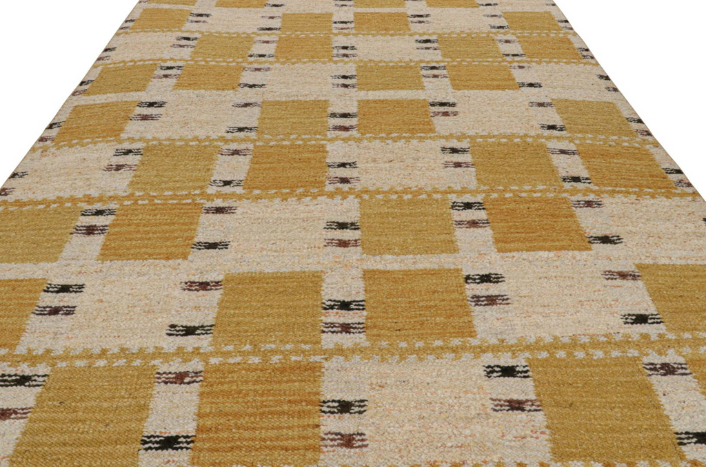 Checkered patterned rug with beige and brown squares on a white background