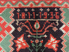 Close-up of a woven textile with decorative patterns and the year 1811 1936.
